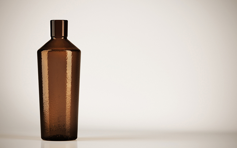 A handcrafted language for industrial bottles with a signature identity